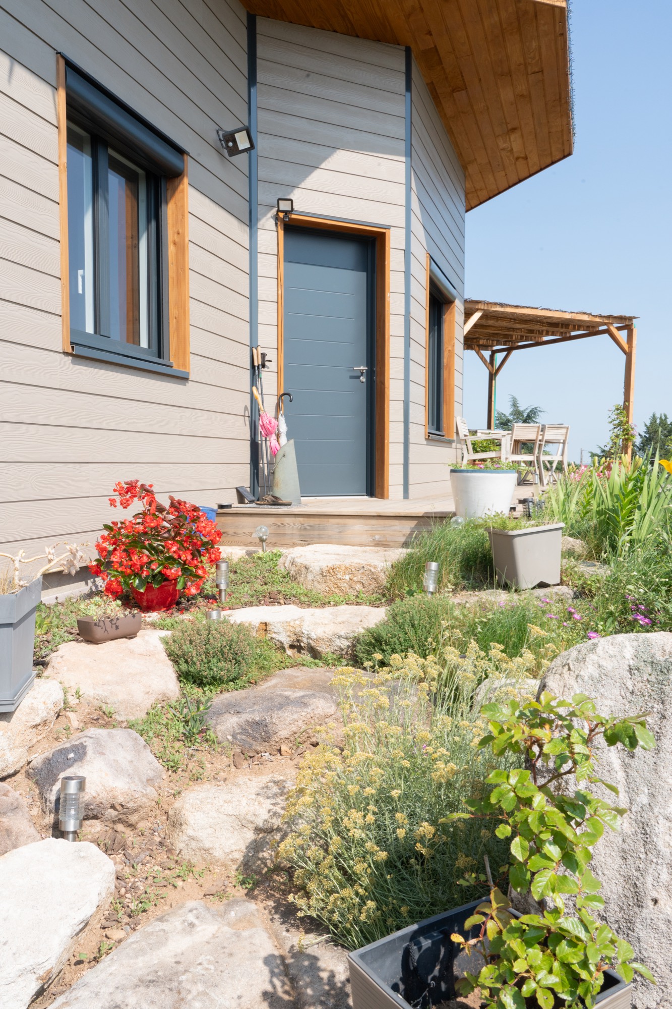 Maison ossature bois avec finition en bardage fibrociment