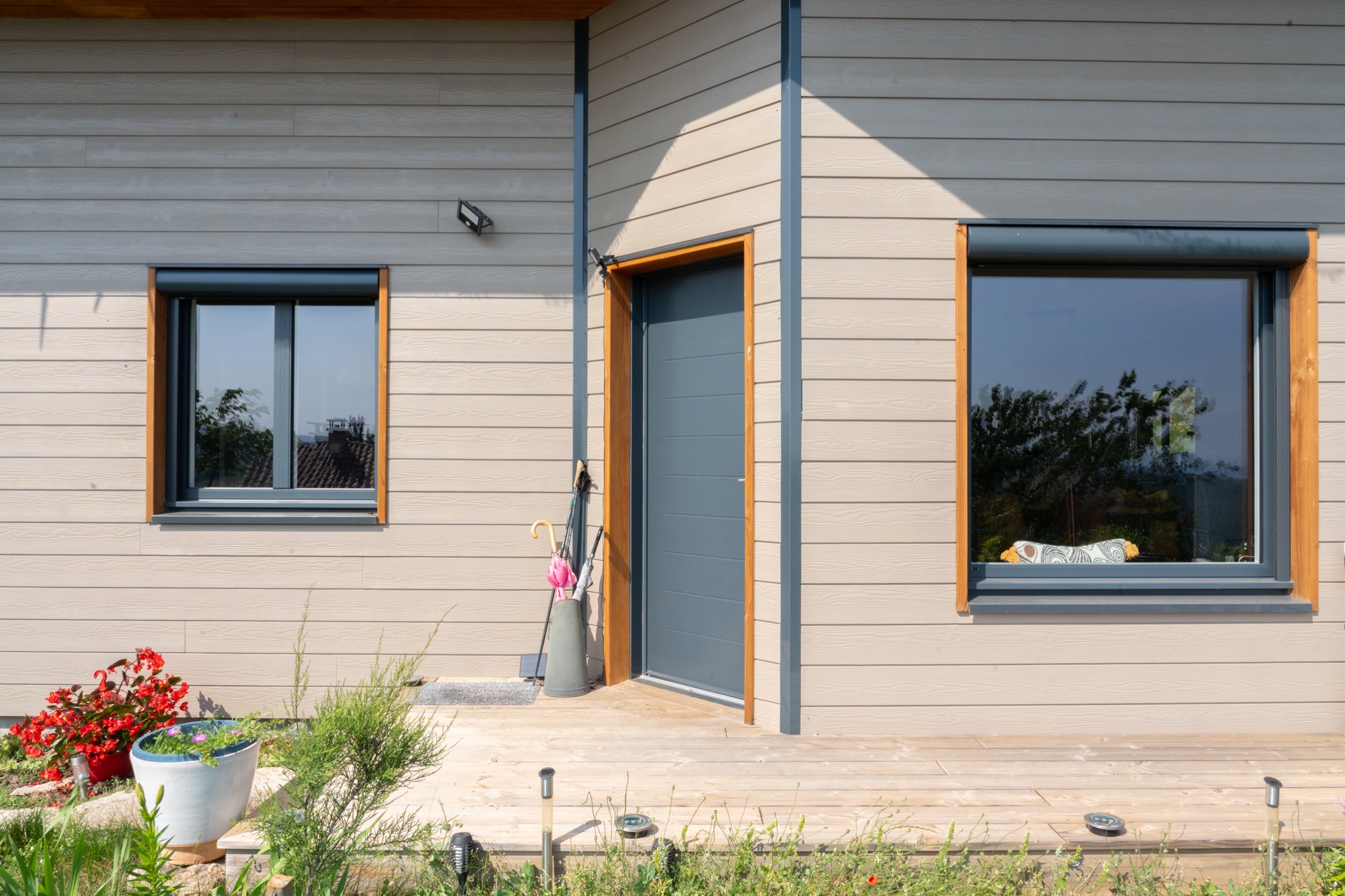 Maison ossature bois avec finition en bardage fibrociment