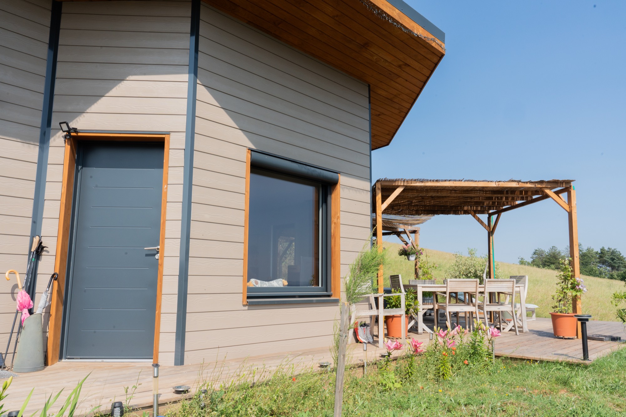 Maison ossature bois avec finition en bardage fibrociment